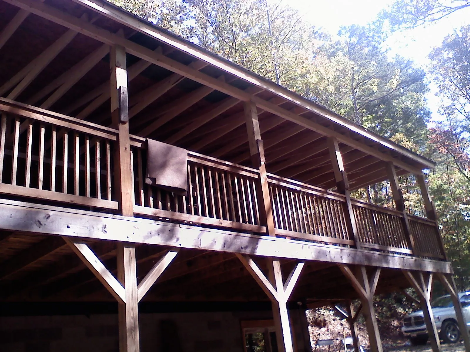 Timber framing under a new elevated porch and deck — Roof Leak Repair in Rudolph by Roofing Brothers